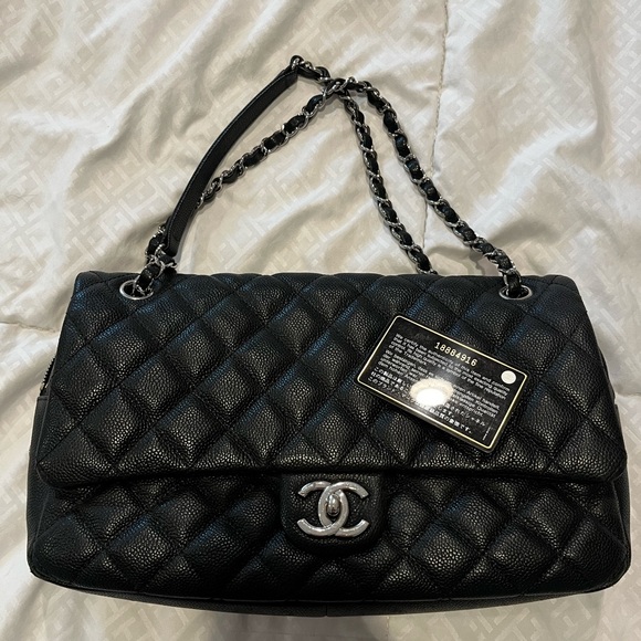 CHANEL Handbags - Authentic CHANEL flap bag. Black Caviar leather. Silver hardware.